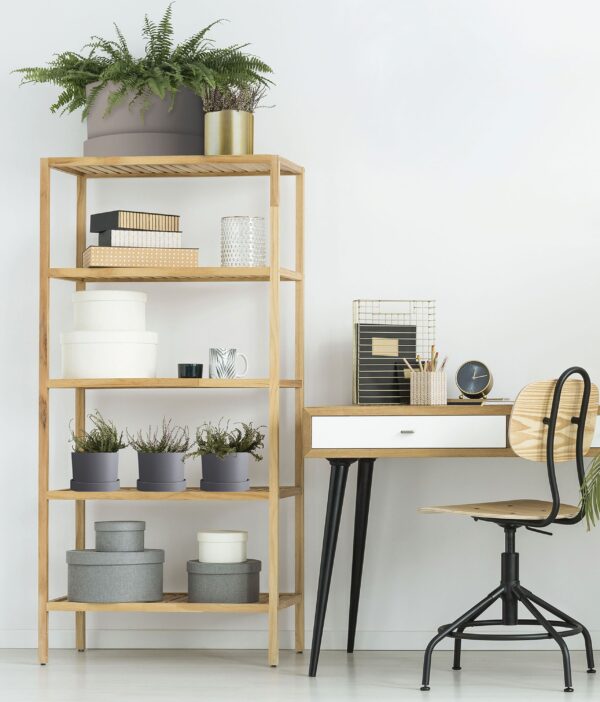 Mathers Cement Gray Planter in several sizes on an open wooden bookcase in a home office setting